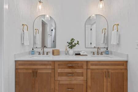 Master Bathroom on 1st floor with walk in shower, and double sinks.