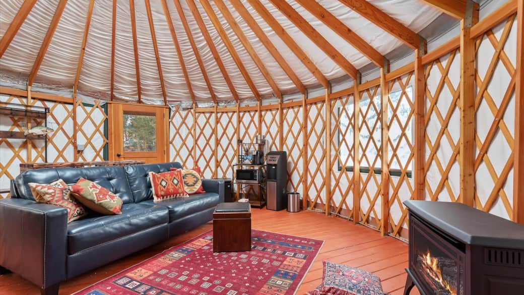 Yurt 1 Interior View Couch and Fireplace