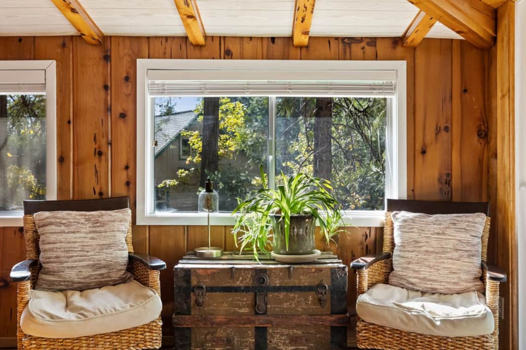 Discover your serene escape! This reading nook, nestled by the large slider, invites you to bask in the glow of ample natural light, creating the perfect spot to unwind and immerse yourself in a good book. ☀️✨ #CozyReadingCorner #NaturalLightHaven