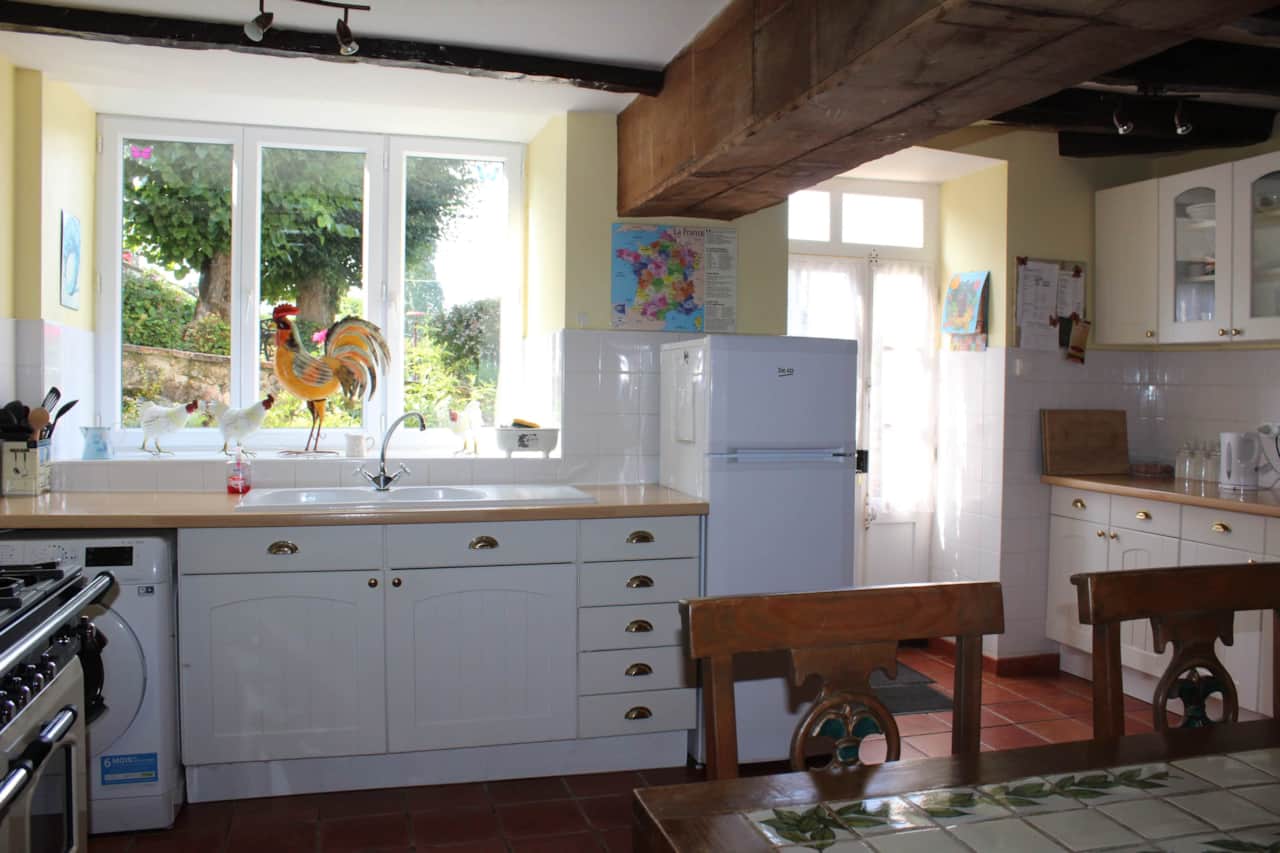 The kitchen looks out on to the pretty garden