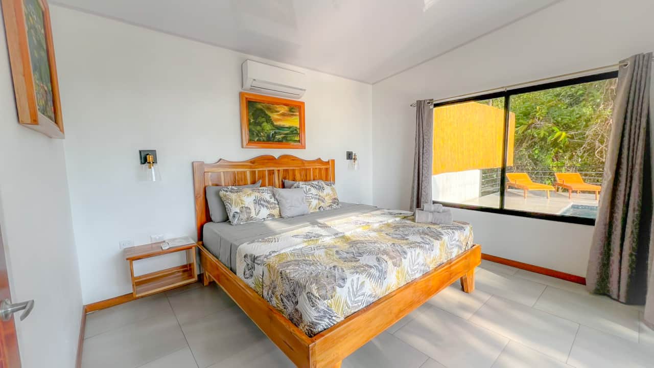 BEDROOM WITH POOL VIEW