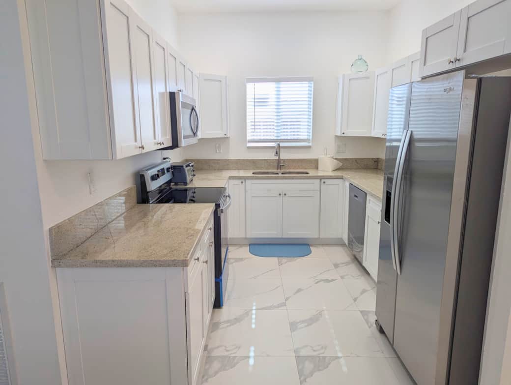 Kitchen – Fully stocked kitchen with stainless steel appliances.