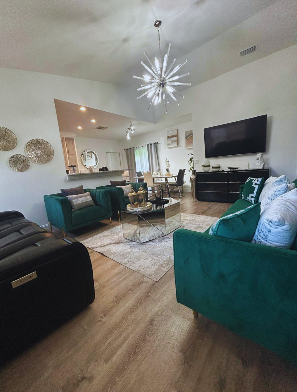 Inviting living room with cozy sofas, stylish decor, and a coffee table.   Lakeland, FL