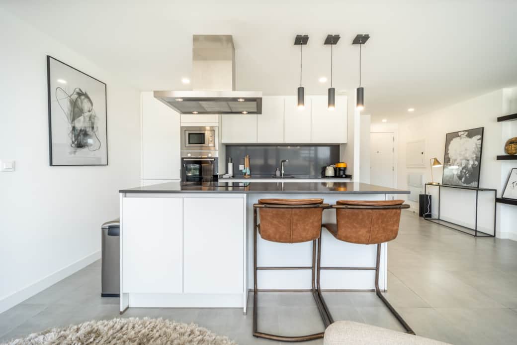 Fully equipped kitchen with modern appliances.