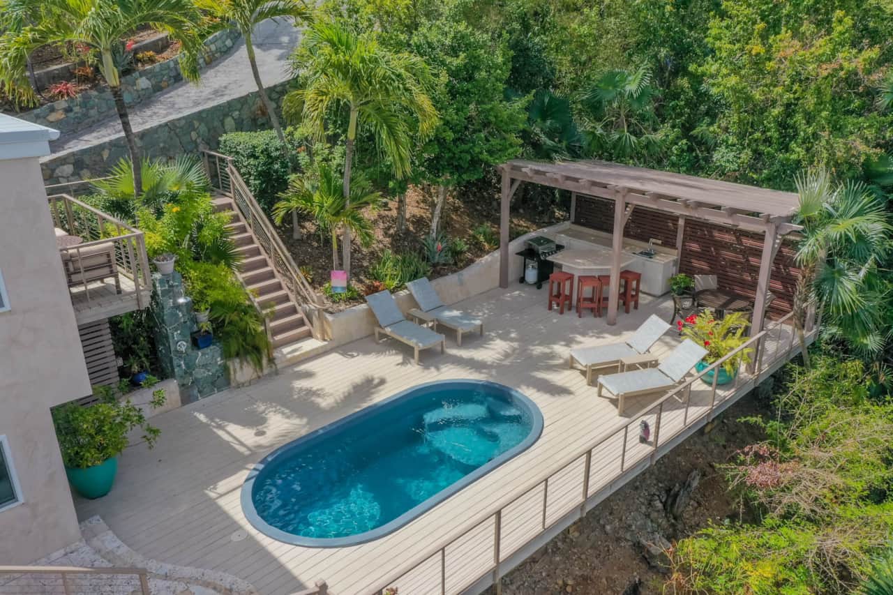 Expansive pool deck and lounge area