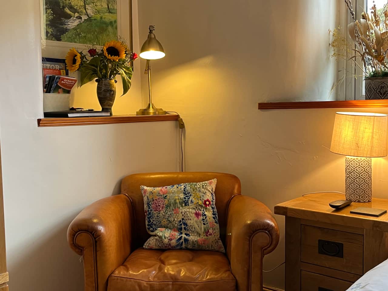 Leather easy chair and reading lamp.