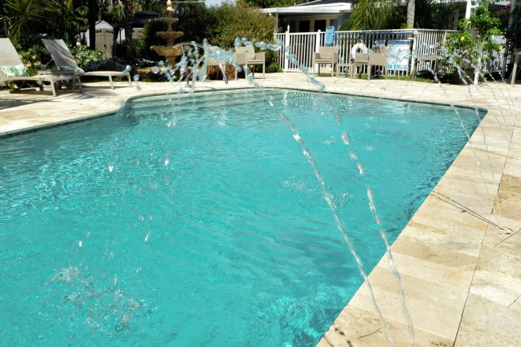 Heated Pool has 4 water fountains into the pool