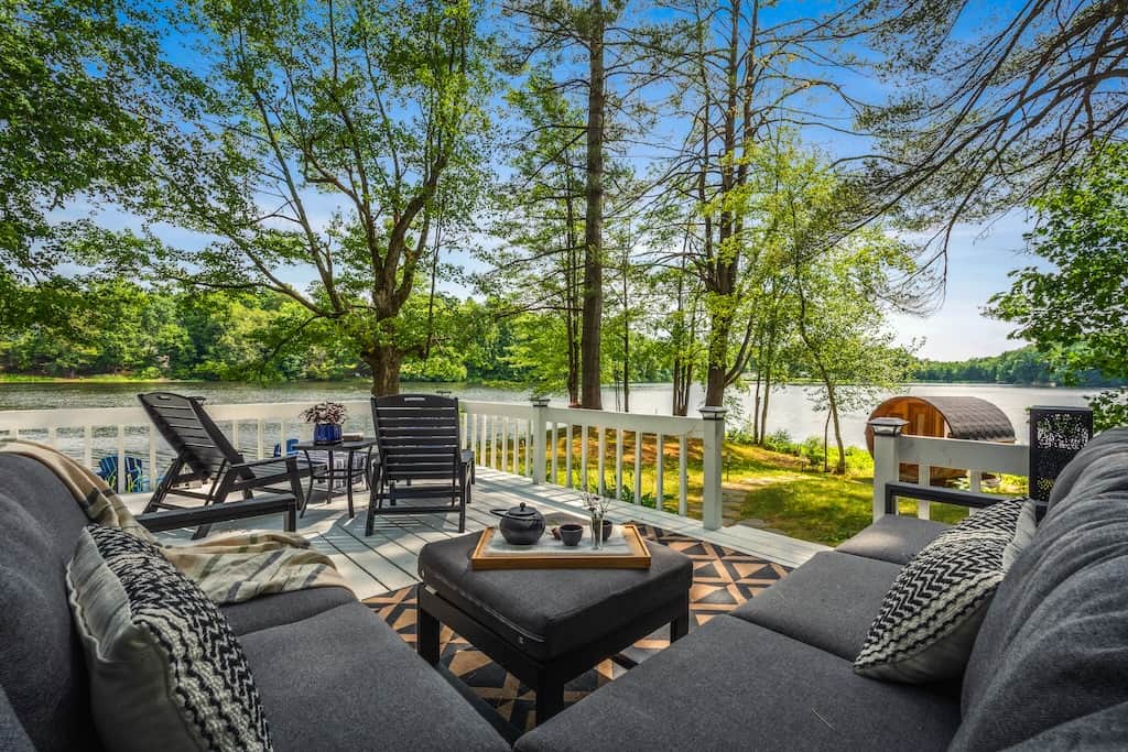 Indulge in outdoor living with our inviting patio, plush seating and covered dining area