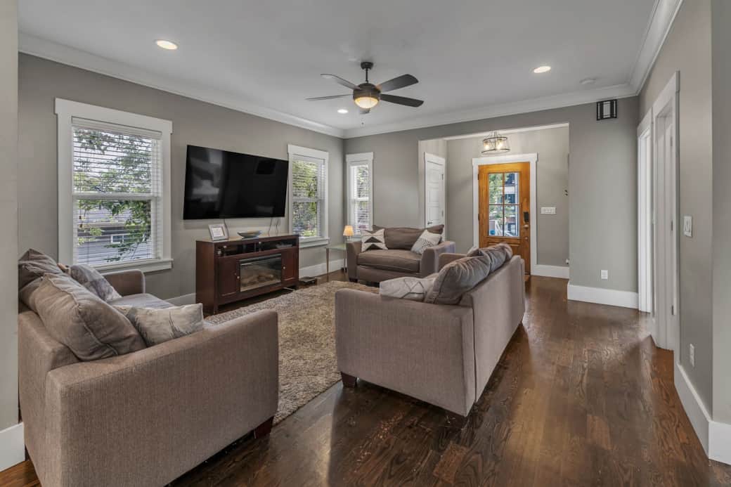 Living Room with 2 Pull out queen sleeper sofa and 65 inch Smart TV