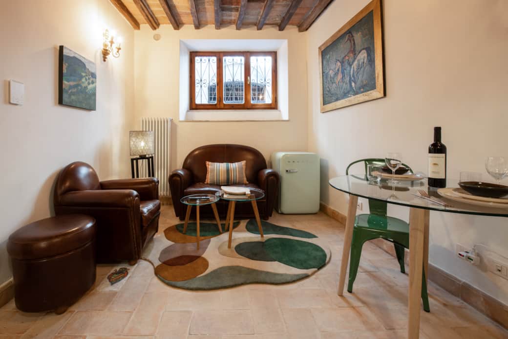 Bright ground floor apartment with wood beams and terracotta tiles in Todi, Italy Bright ground floor apartment with wood beams and terracotta tiles in Todi, Italy