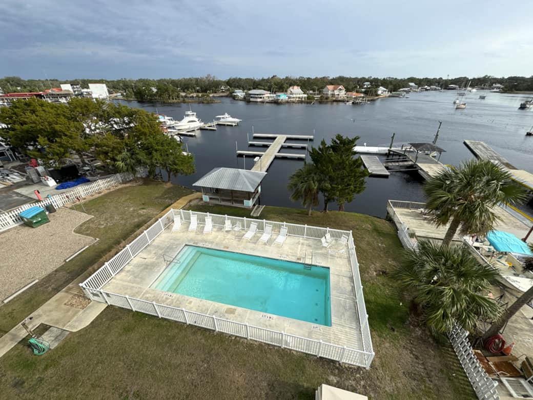 Looking down at Pool and Dock from Balcony.