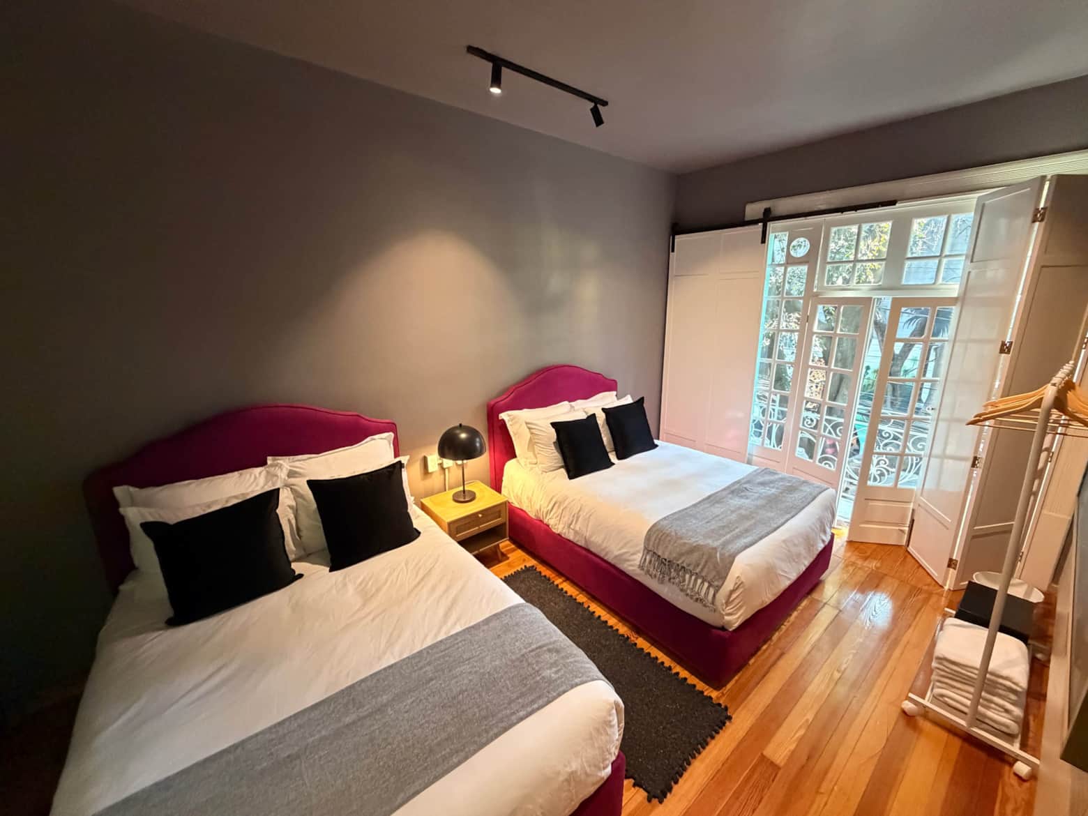 Double suite with warm textiles and natural light