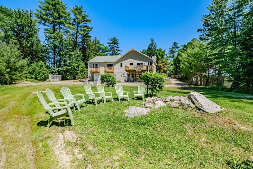 Large private yard with firepit. Waterfront is on the other side of the house.