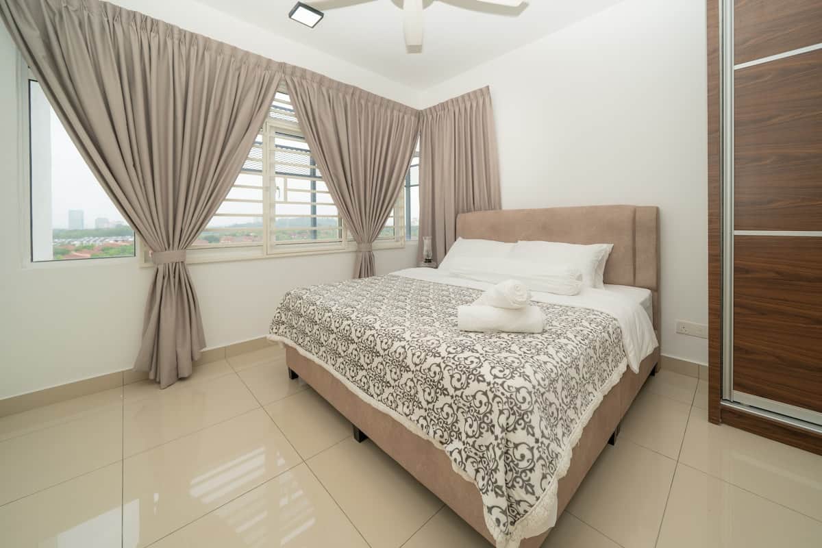 "Unwind and get a restful night's sleep in our plush, comfortable bedroom.