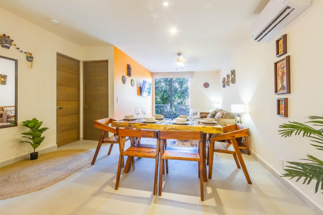 Unforgettable moments await at our dining table for six, complete with dinnerware and wine glasses.