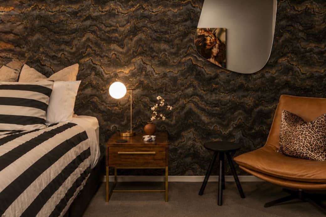 Sink into a king bed with a plush pillowtop mattress for a restful night's sleep.