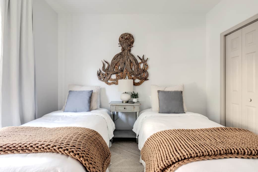 Second floor guest room with two twin beds, tv and private bathroom. Second floor guest room with two twin beds, tv and private bathroom.