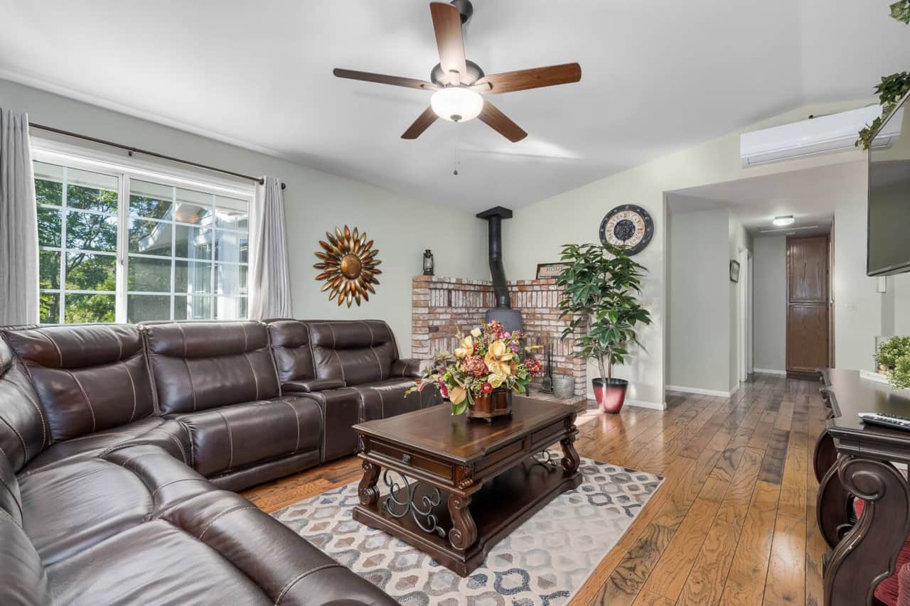 Living Room with wood burning stove and mini split- 2nd Floor