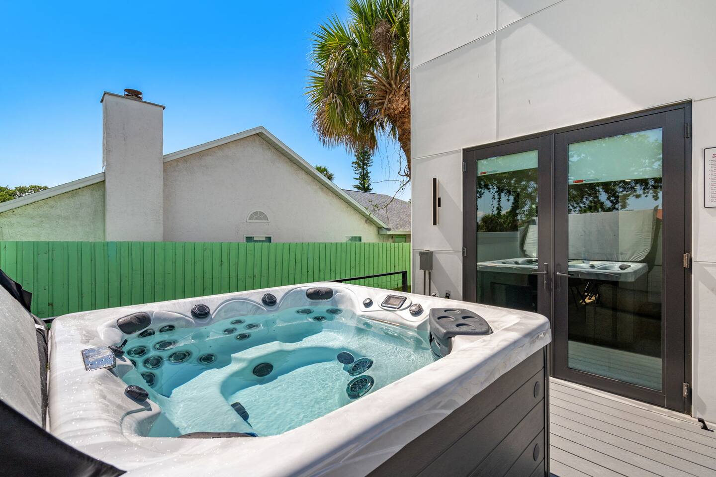 Relax and unwind in the hot tub, perfect for your sunset soak.
