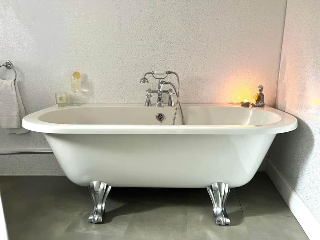 Relax in this sleek & full bathroom. Book your stay for ultimate comfort!