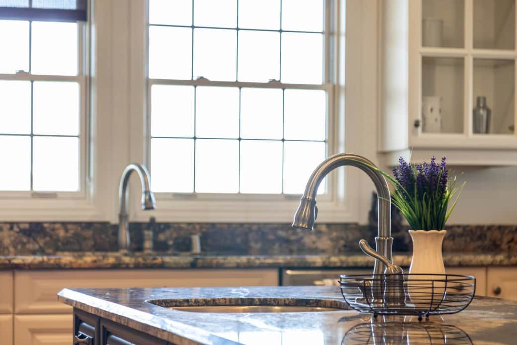 Dual faucets in Chef's kitchen.