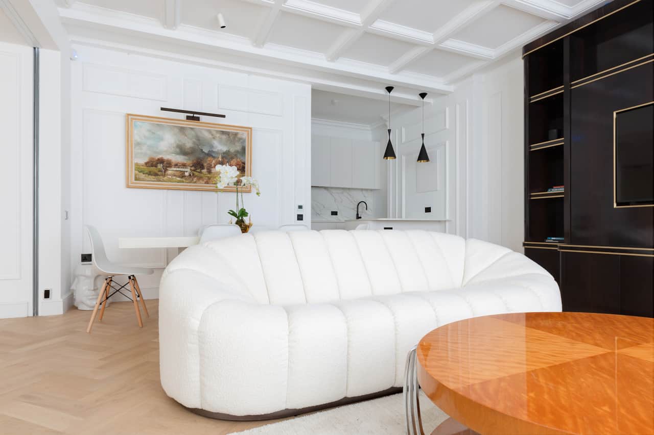 Living room seating with original artwork and inlaid coffee table