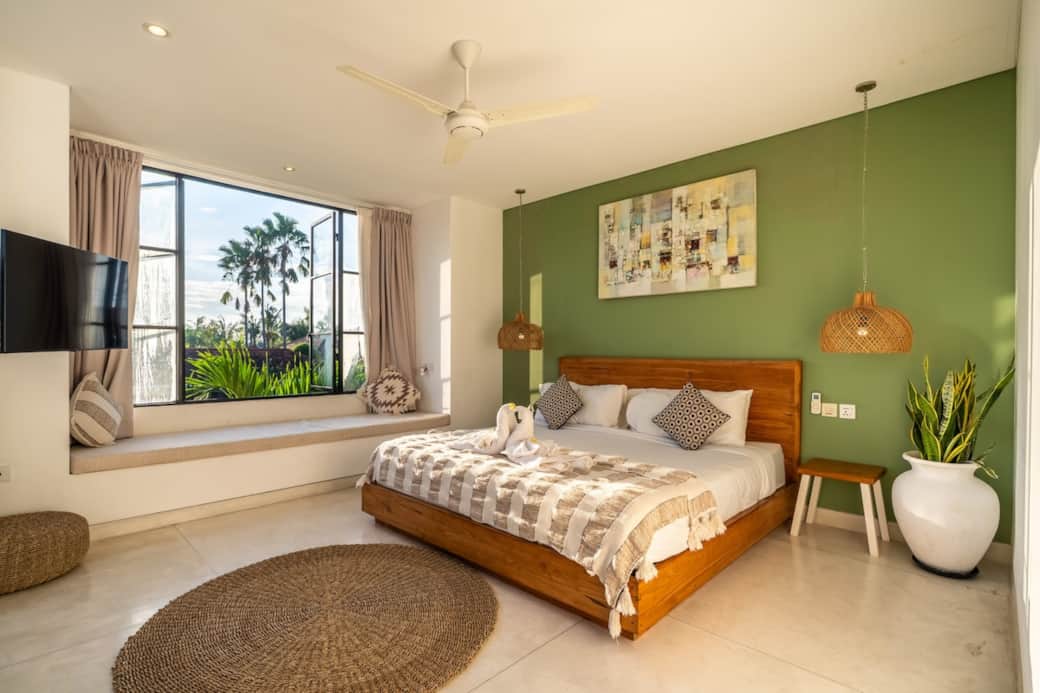 A cozy king-size bed, soft linens, and beautiful Bali views — the perfect retreat after a day in the sun. Just open the door and step straight out to paradise.