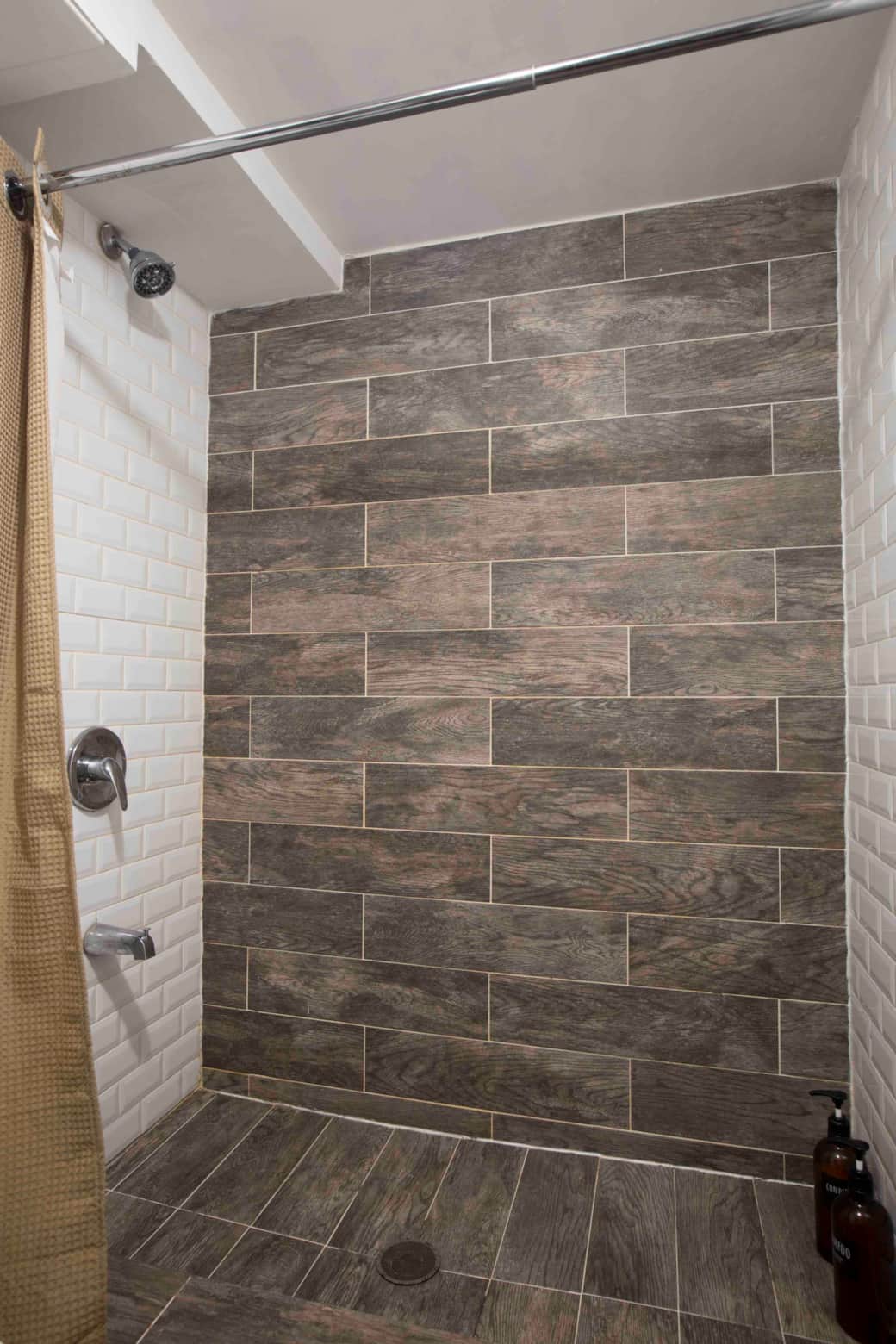 The downstairs bathroom has a walk-in shower
