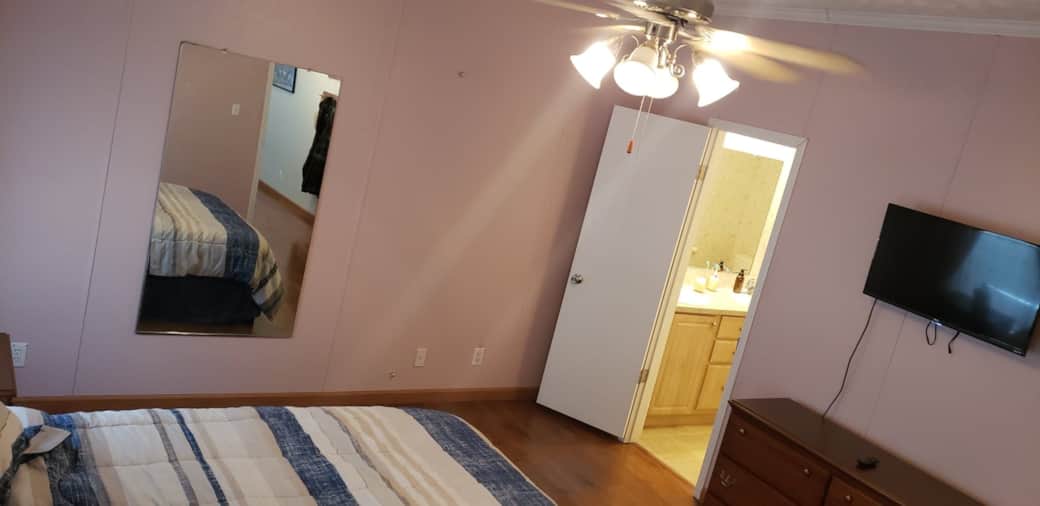 Master Bedroom has TV and Master Bath
