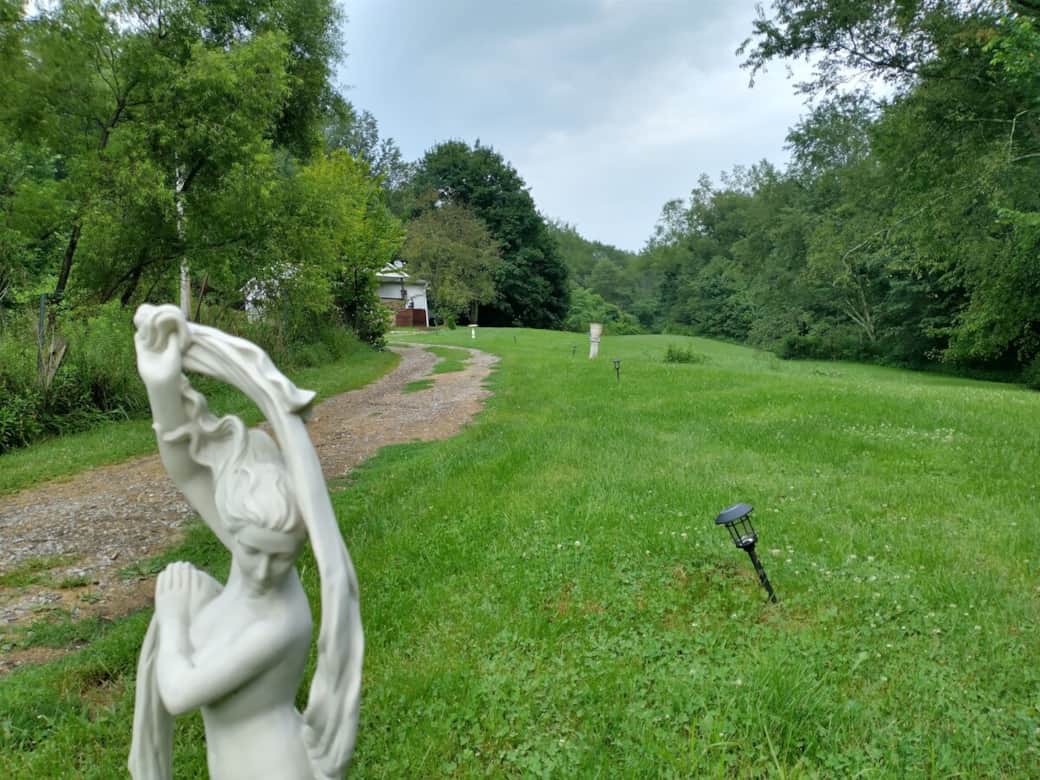 Drive to house with Pond On Left and 2k Acres Of Wildlife Area All Around
