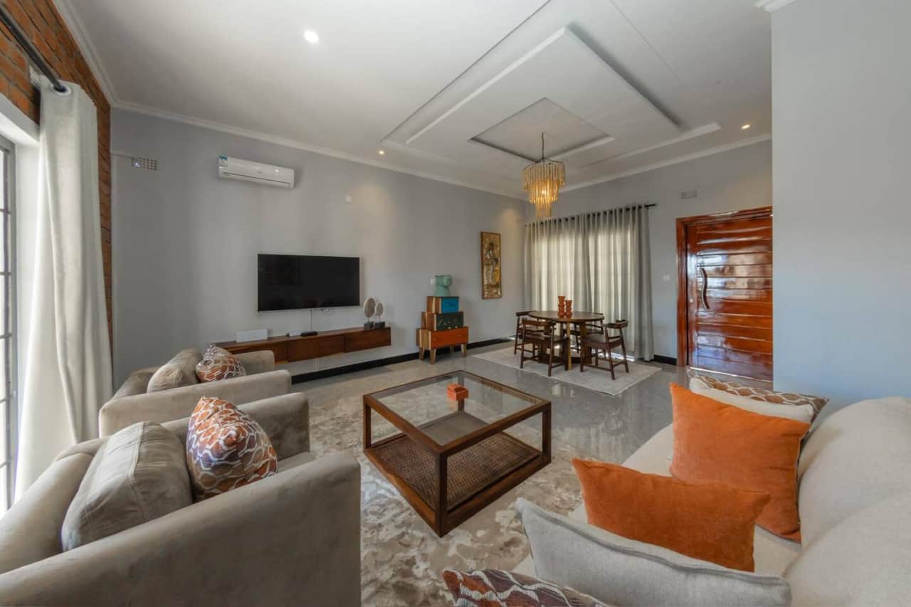 Brighton open-plan living room with smart TV and dining table