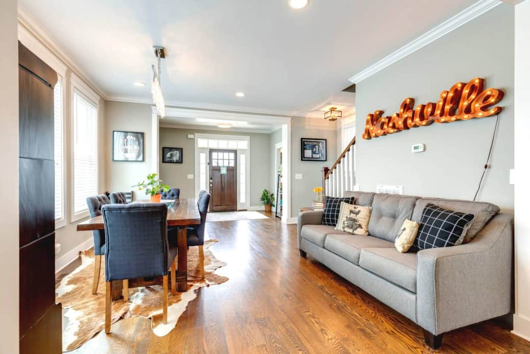 Another view of the sleeper sofa and dining room