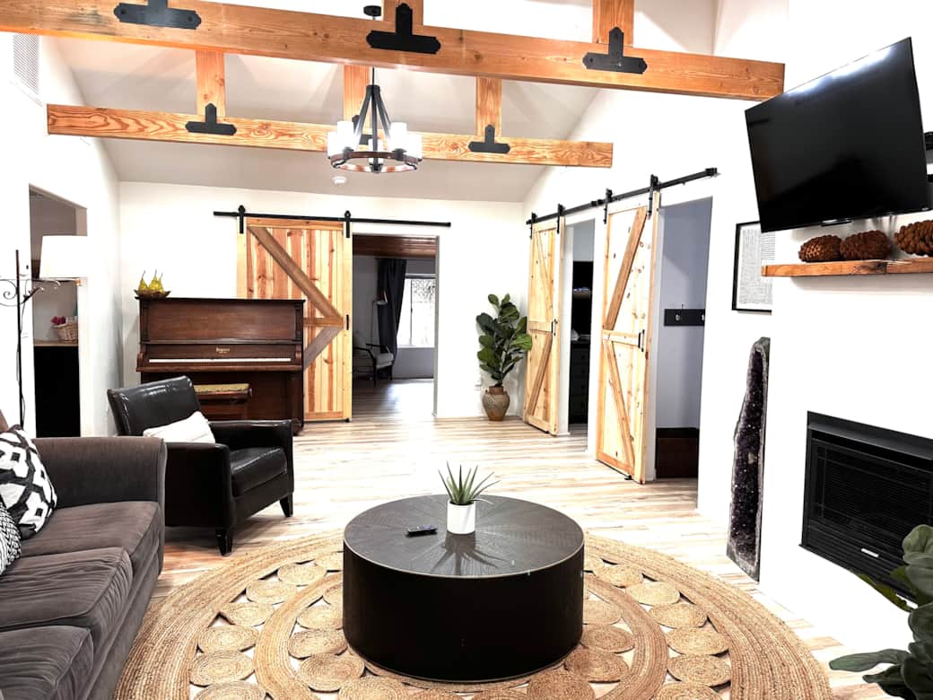 High ceilings, barn doors and cozy furniture beckon you to come stay for a weekend or a week!