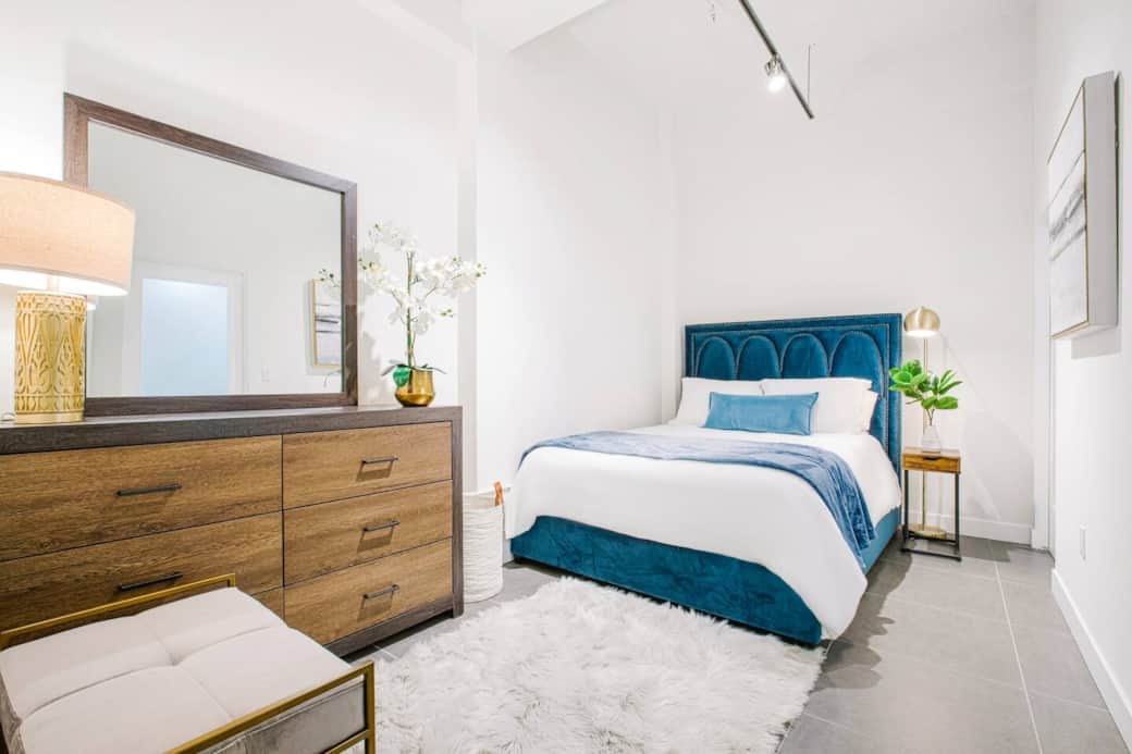 Inviting sleeping area adorned with tasteful furnishings, creating a comfortable and stylish haven.
