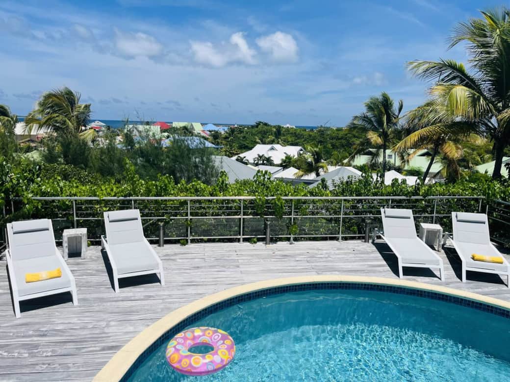 View from the terrace overlooking the pool and Orient Bay Nymphea
