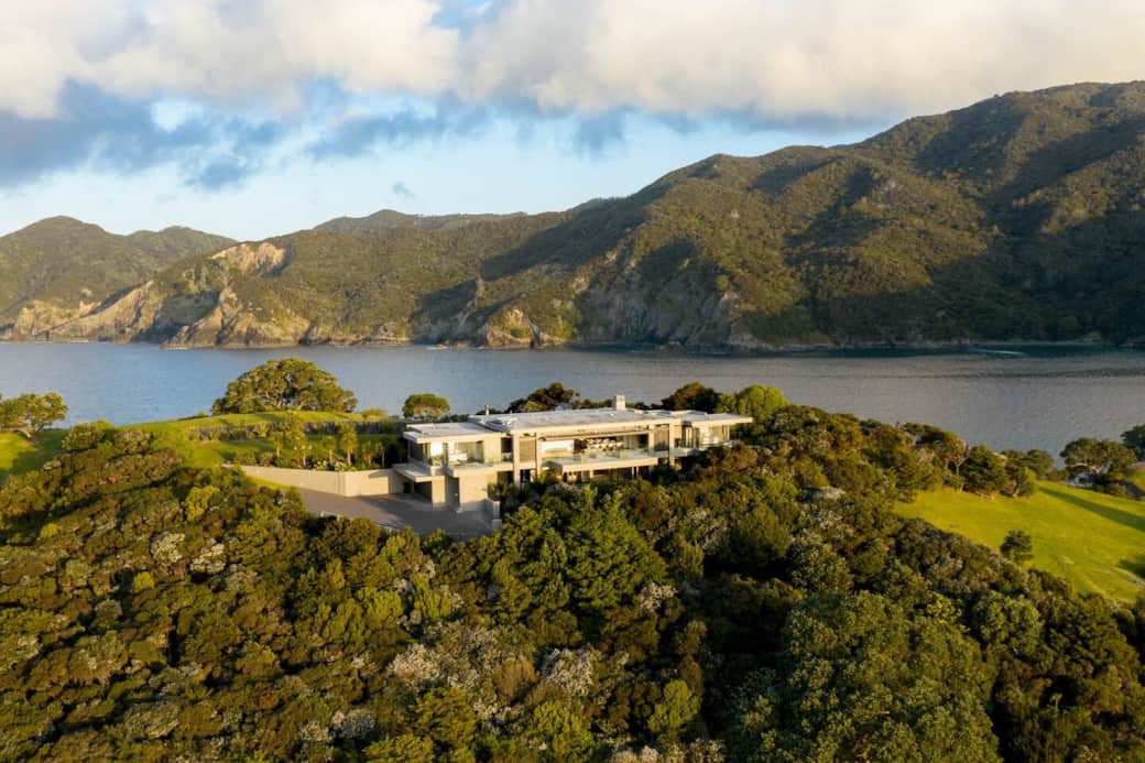 The house sits proudly on top of a ridge allowing views on either side of the house.