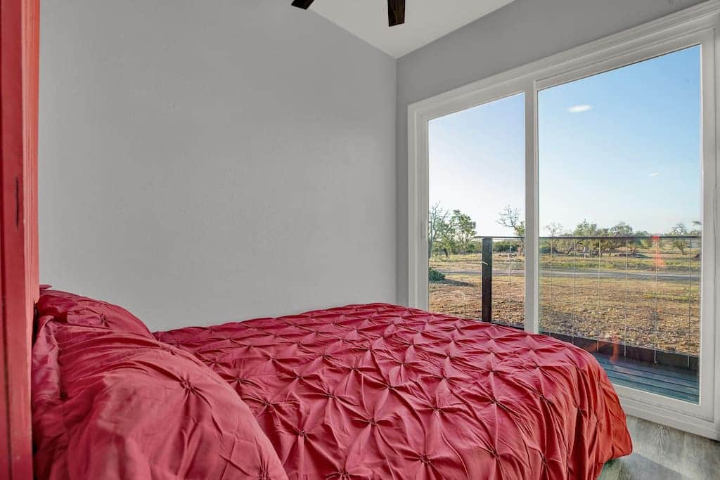 2 queen bedrooms with sliding glass door to 100sqft patio