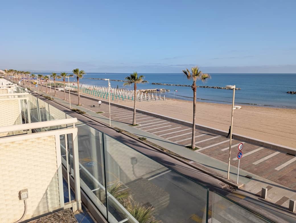Beach and seafront promenade directly in front