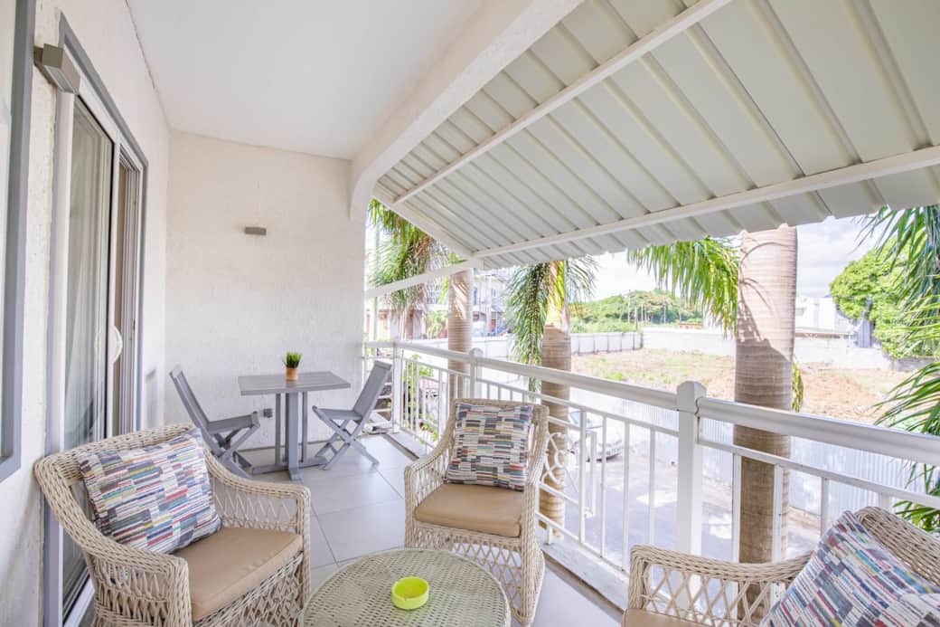 Spacious balcony overlooking the back garden and road