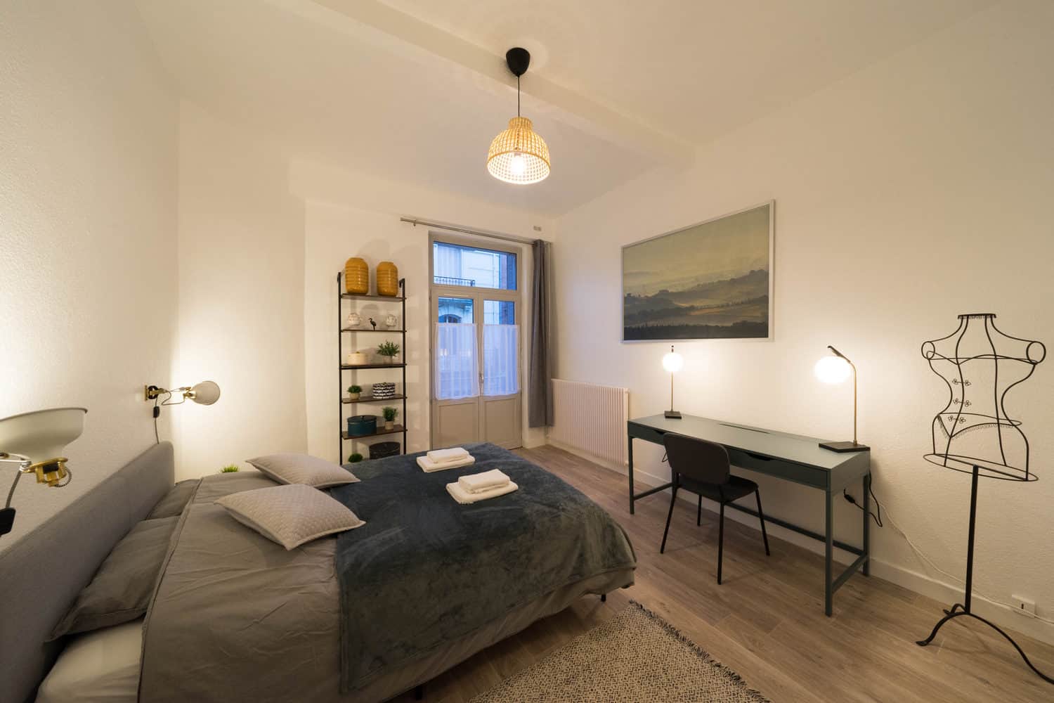 Chambre avec literie premium pour la récupération post-course à Vichy