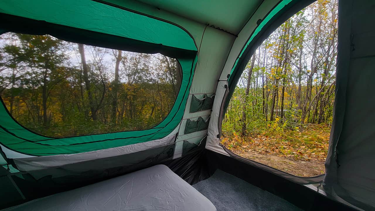 Tilia inside tent looking out fall