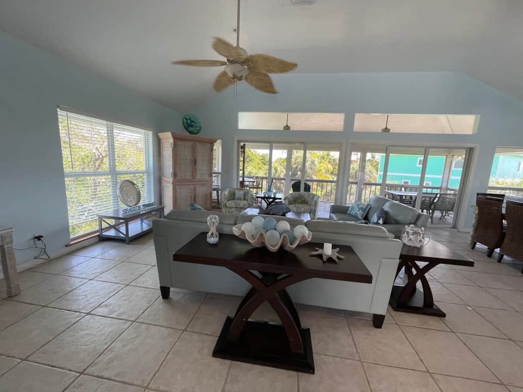 Living room spacious open floor plan with smart tv and ocean breezes.