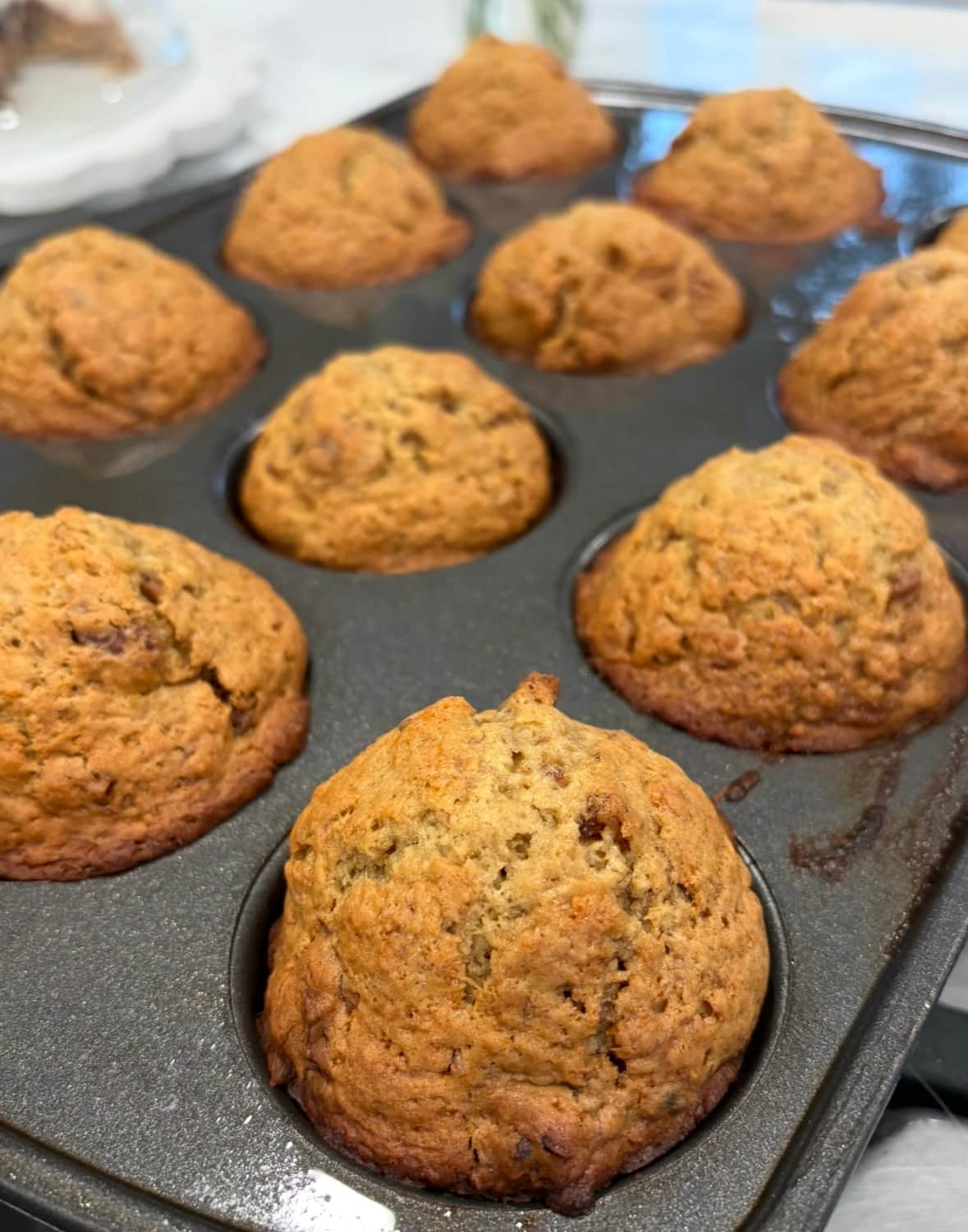 Cookware and bakeware setup including pots, pans, baking sheets, and prep tools at White Magnolia