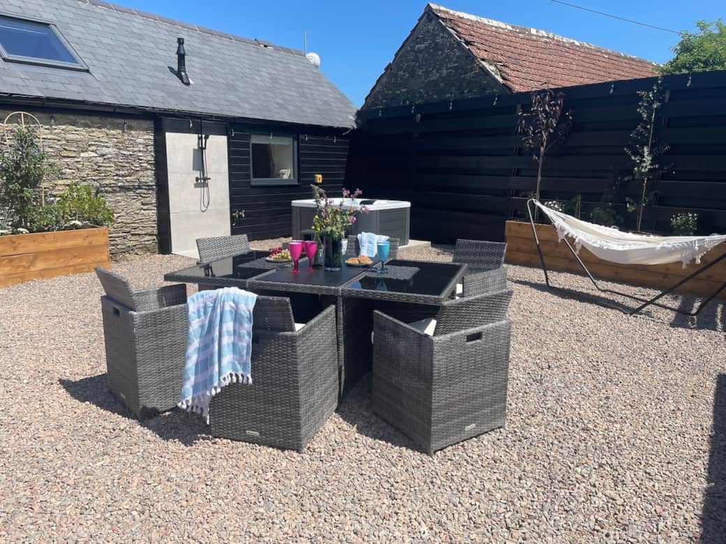 Your south-facing private courtyard with a hot tub, perfect for unforgettable nights beneath the stars, and dog friendly too.