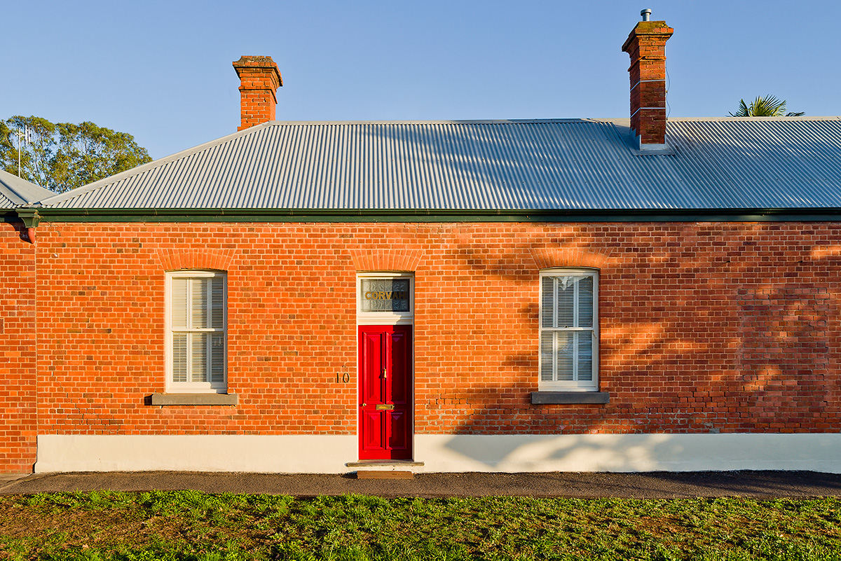 Red door opens to a perfect home