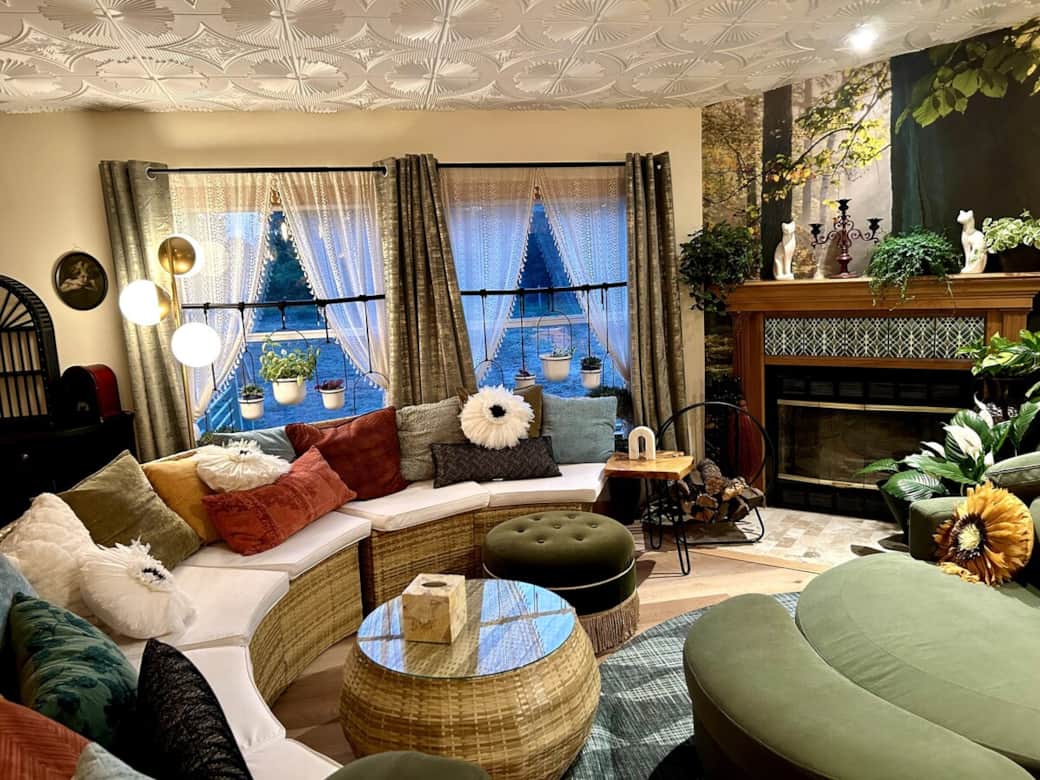 Designed with an open concept, the main room seats up to 30, offering a blend of couches, chairs, adjustable stools, back jacks, and floor cushions.

The space is warmed with comfy throws, plush cushions, tissues, plants, and even a guitar.
