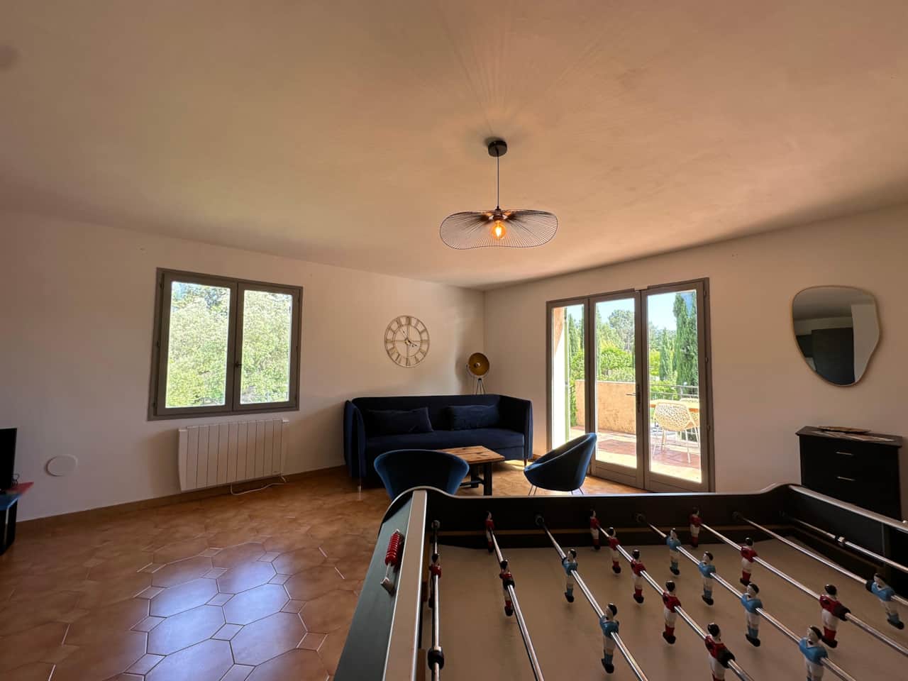 living room, foosball, sofa, chairs