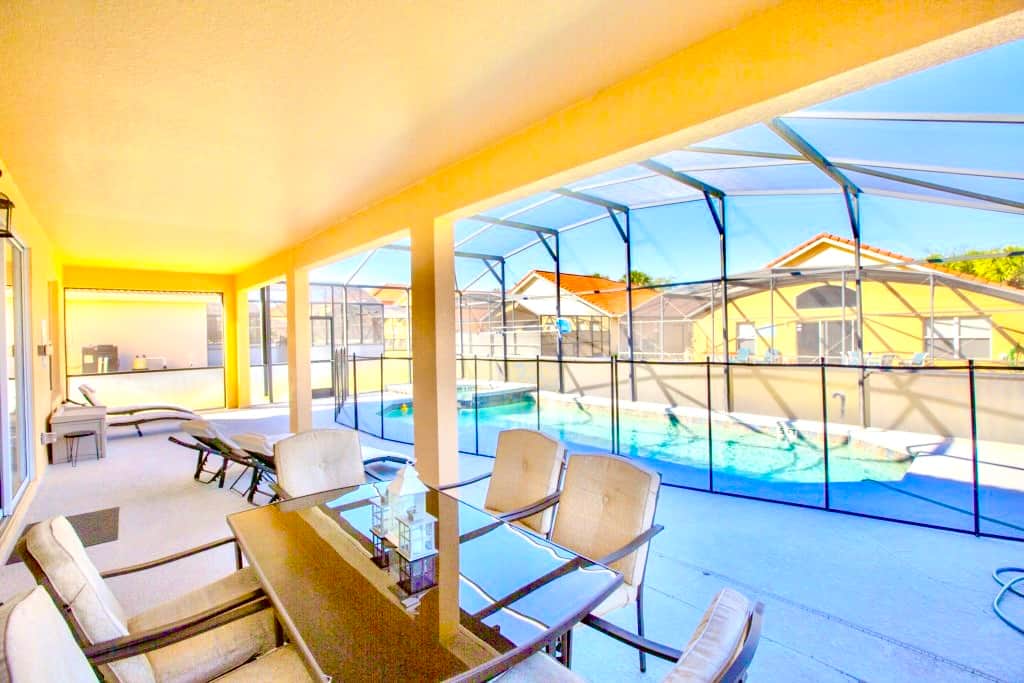 Large deck space with the pool and spa