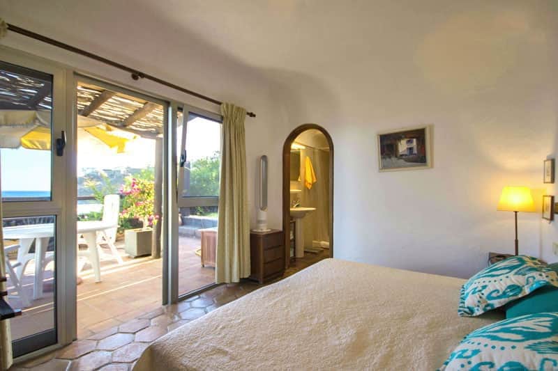 Rocadelmar1 first bedroom doublebed terrace glassdoors seaview