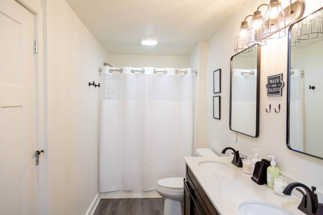 Sage Green Getaway - Sizeable bathroom includes double vanity, toilet and tub/shower combo. Sage Green Getaway - Sizeable bathroom includes double vanity, toilet and tub/shower combo.
